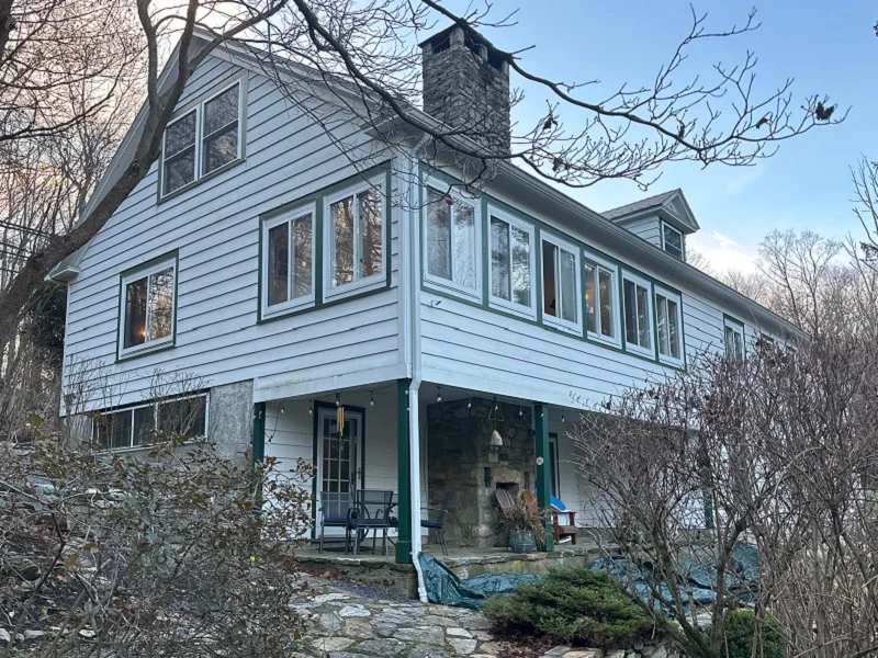Wood porch windows needing replacement